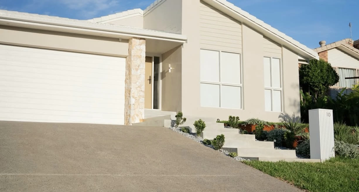 The finished frontage, rendered and planted