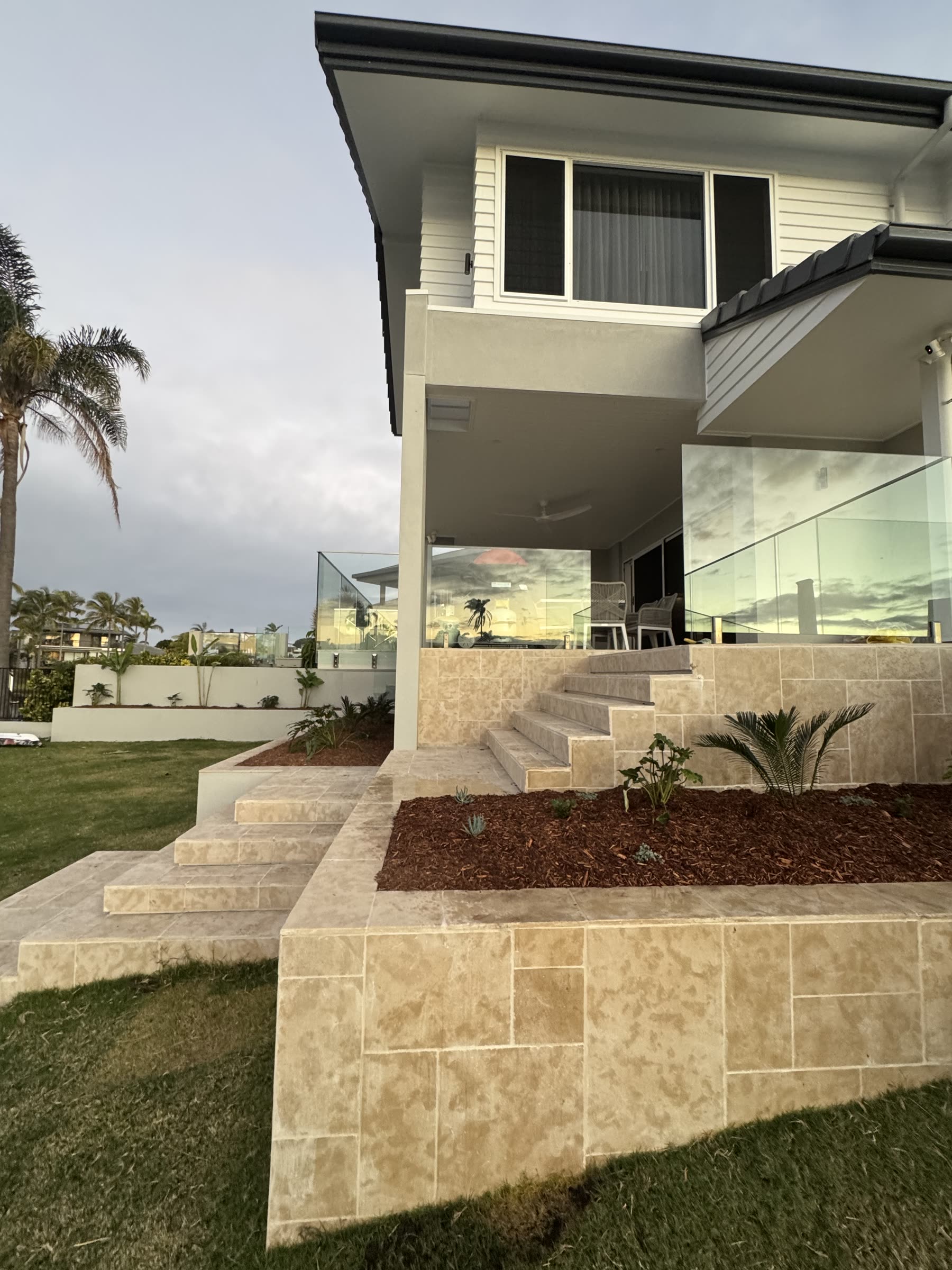 Travertine steps and fresh planting